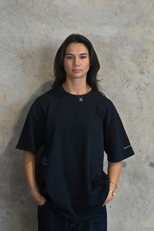 Model wearing Midnight Oversized Heavy Tee by Thirty Four Thirty Four in dark navy cotton